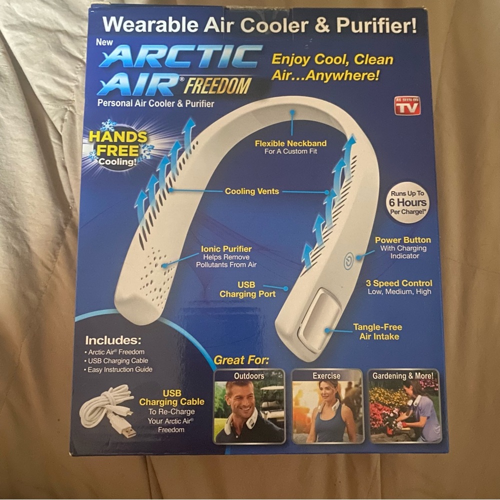 Arctic Air Freedom, a wearable personal air cooler and purifier. 
NEW IN BOX - Picture 2 of 4